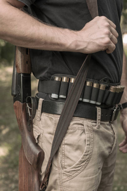 istock hunting rifle and cartridges 841095054