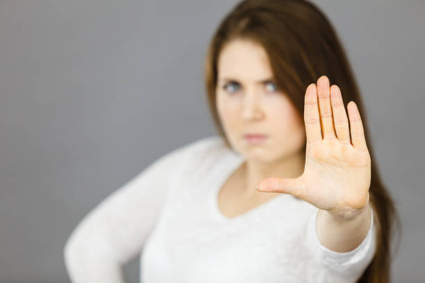 istock Angry apodicticity woman showing stop with hand 841102956