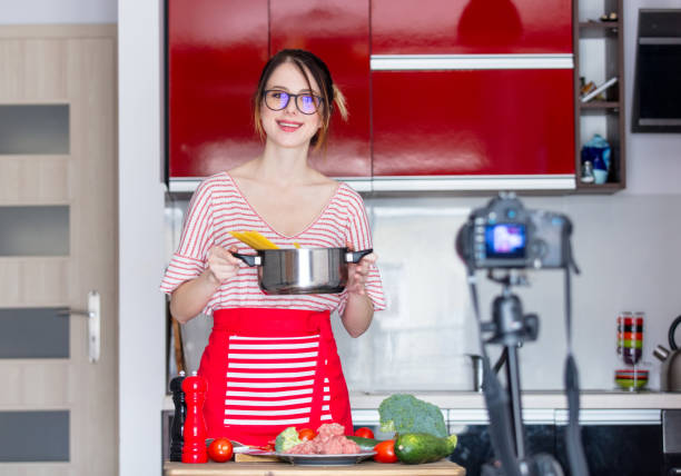 istock woman cooking for Video-sharing website 841106388