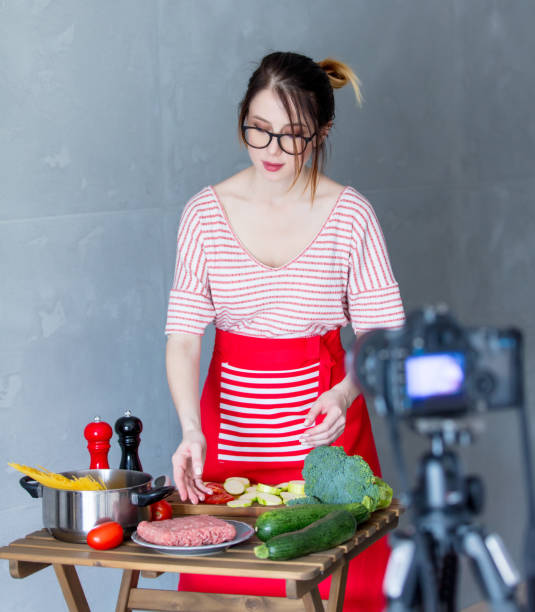istock woman cooking for Video-sharing website 841106412