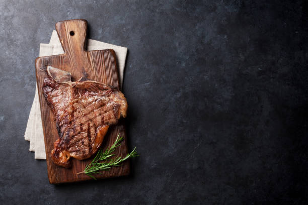 t-bone steak - beef meat t bone steak steak imagens e fotografias de stock