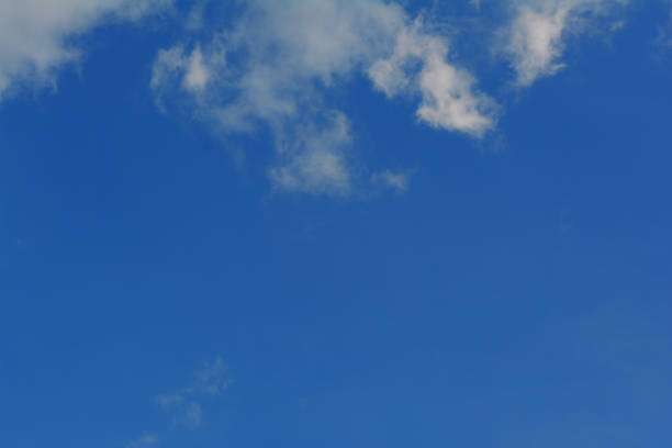 istock white clouds and blue sky in sunny day 841109320