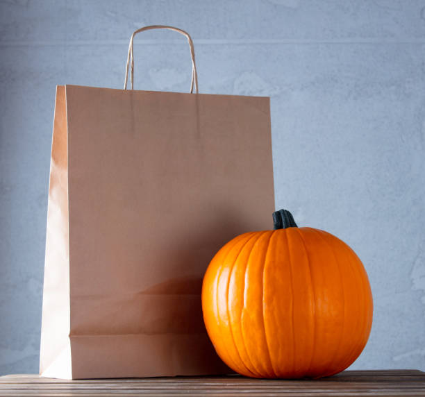 istock Fresh Autumn pumpkin and ECO shopping package 841110610