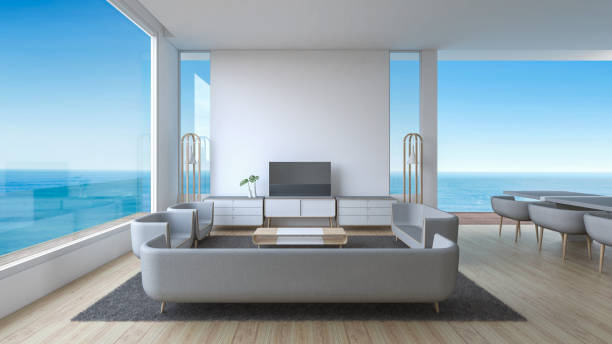 istock Modern Living room wood floor with sofa set panorama sea view summer 3d rendering 841111644