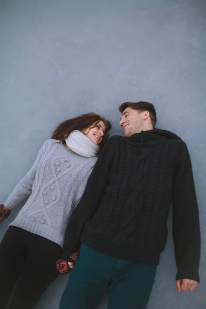 istock Couple laying on the ice together 841113810