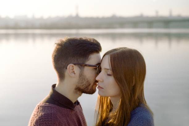 istock Couple walking near the river 841114048