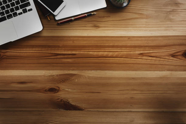 istock Mock up  Work space: wood desk table with copy space and office  supplies. 841114154