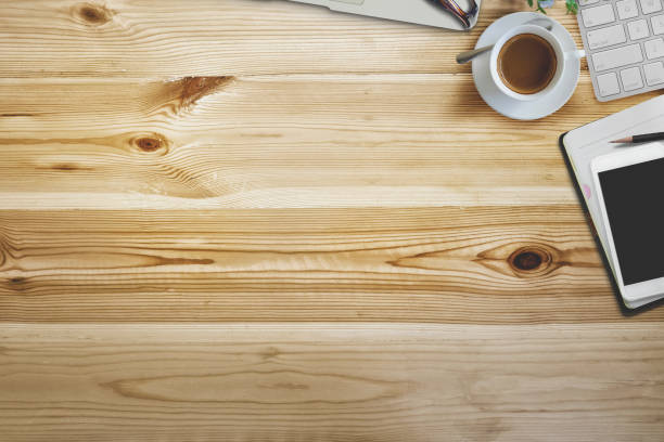 istock Mock up  Work space: wood desk table with copy space and office  supplies. 841114882