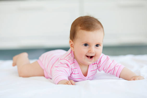 istock happy baby girl 841126212