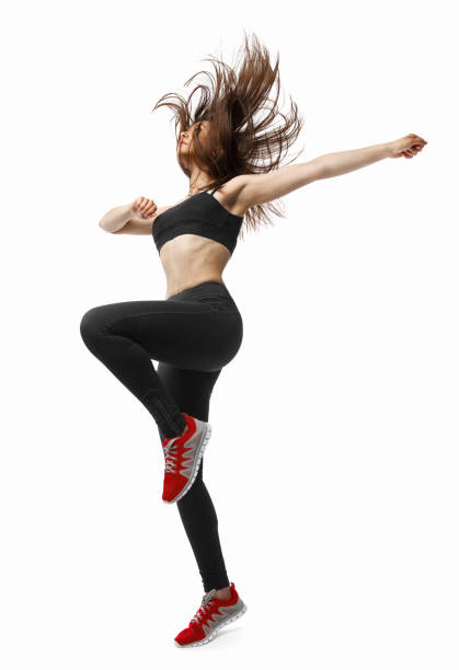 istock Beautiful young fit modern dancer lady dancing with her long hair flying 841126430
