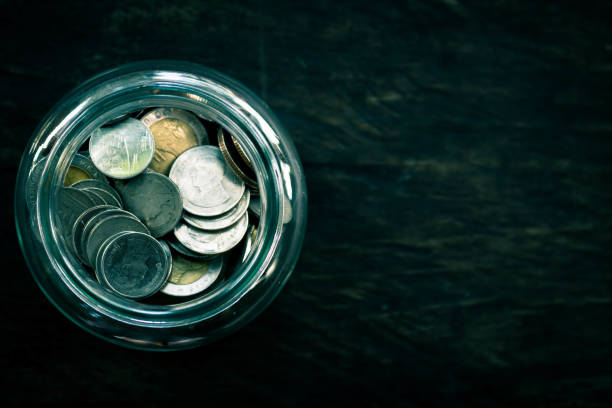 istock Coin on wood background, concept save money for the future. 841129170