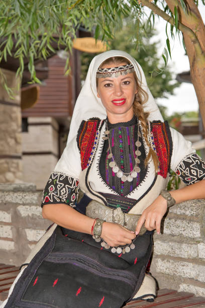 istock Bulgarian folklore. Woman in authentic costume. Old Nessebar. Bulgaria. 841133178
