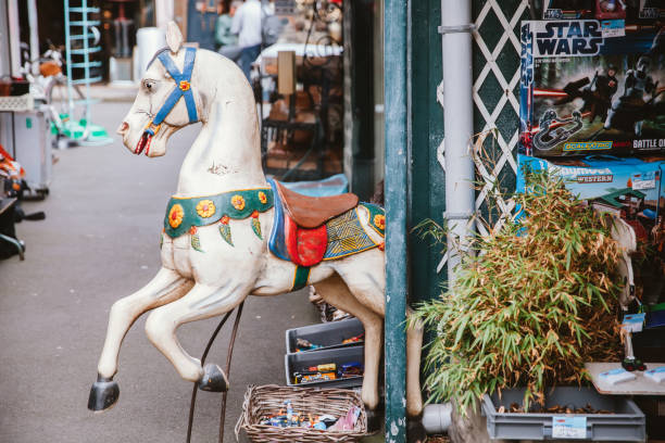London, UK - Aug 5, 2017: People visiting the iconic Horse Stables Market in Camden late in the day.