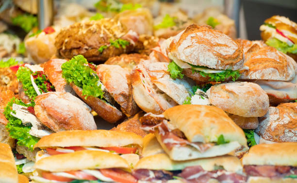 istock Sandwiches on a shop show-window 841140598
