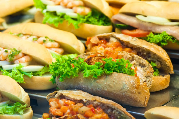 istock Assortment of fresh sandwiches on counter of restaurant 841140708