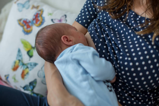 istock Young mother breastfeeding  her newborn baby boy 841144576