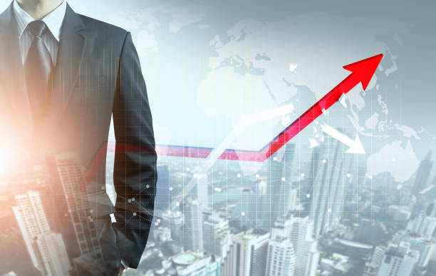 istock Businessman point at increasing graph and decreasing broken graph with city background 841147082