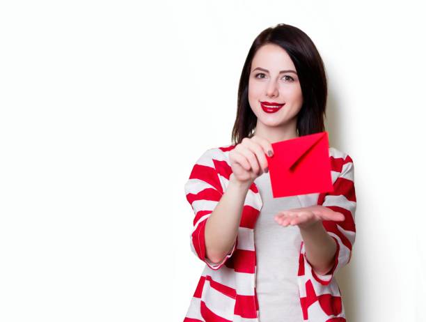 istock girl holding red gift 841147222