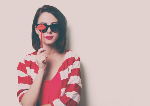 istock young woman with toy 841147302