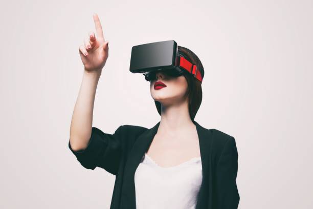 istock woman with virtual reality gadget 841147470