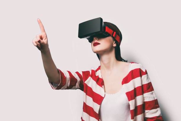 istock woman with virtual reality gadget 841147506