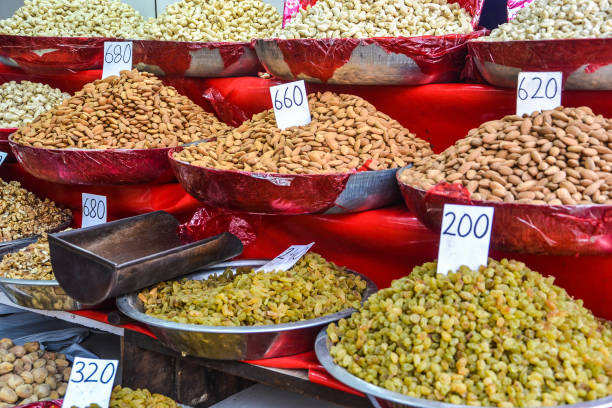 istock olives and nuts on market 841147950