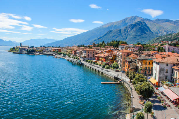 комер см. - lake como water italy sunset стоковые фото и изображения