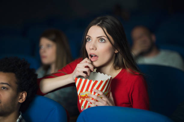 shocking turnover - audience surprise movie theater shock imagens e fotografias de stock