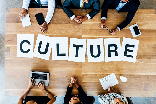 Reunión de trabajo con la palabra cultura en mesa photo