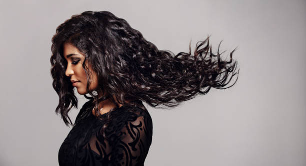 istock Brunette woman with long flying hair 841159532
