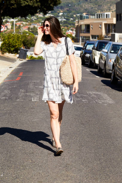 istock Girl walking on road 841161886
