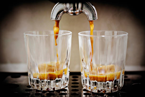 istock Espresso shots pouring into shot glasses. 841162762