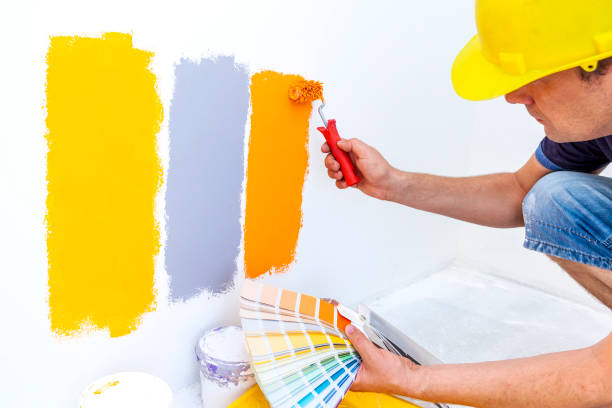 istock Worker choosing paint colors at home 841163198