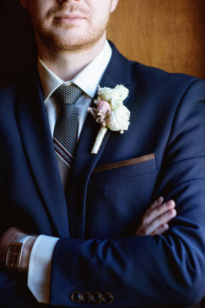 istock Handsome groom in suit in the hall 841177098