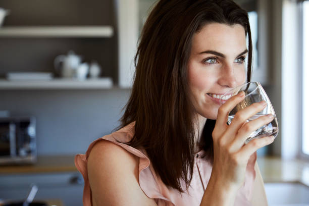 istock Beautiful woman in kitchen 841189442
