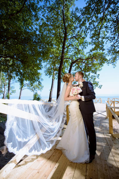 istock Wedding couple on the nature is hugging each other 841195824