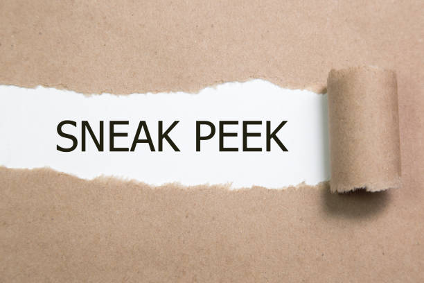 istock The phrase Sneak Peek appearing behind torn yellow paper. 841196242