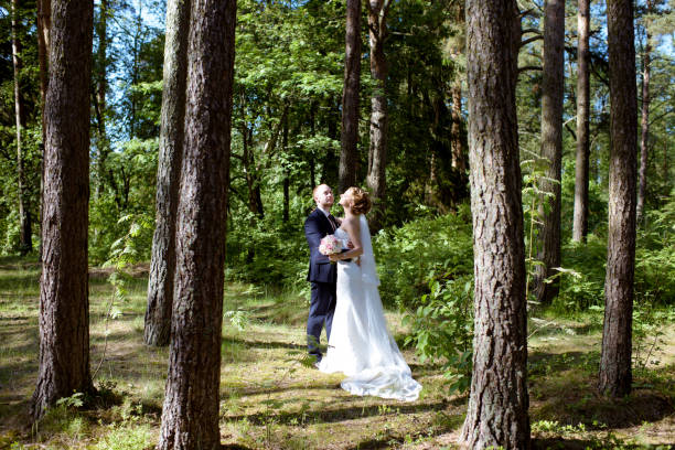 istock Wedding couple on the nature is hugging each other 841196944
