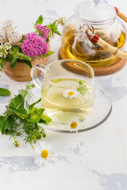 istock Herbal tea with herbs and flowers 841203828