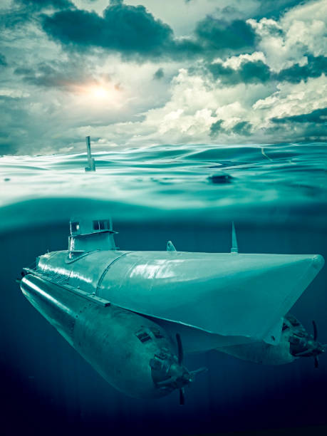 Small submarine supervises the sea stock photo