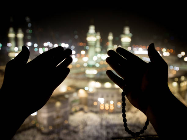Muslim hands praying in Kaaba Muslim hands praying in Kaaba kaabah stock pictures, royalty-free photos & images