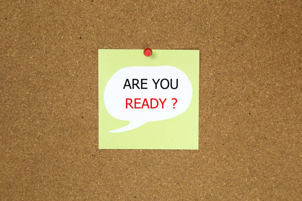istock The phrase are you ready text on a black sticky note posted to a cork notice board. 841238780