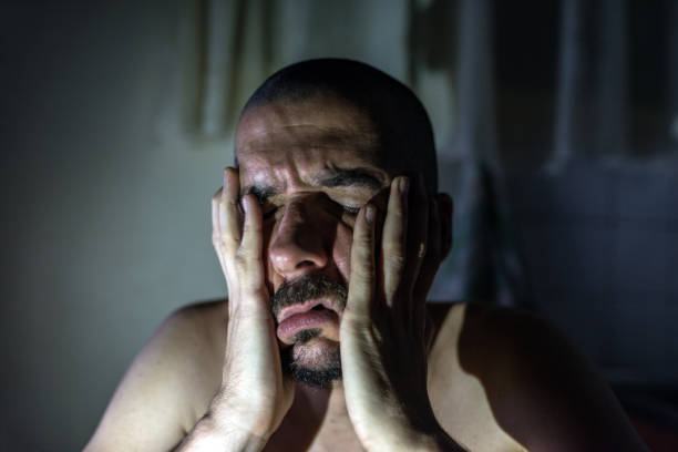 istock The sick man is depressed. Make him like in the world alone. No solution and solution to the problem. 841241860