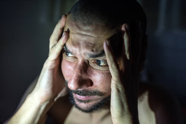 istock The sick man is depressed. Make him like in the world alone. No solution and solution to the problem. 841241880