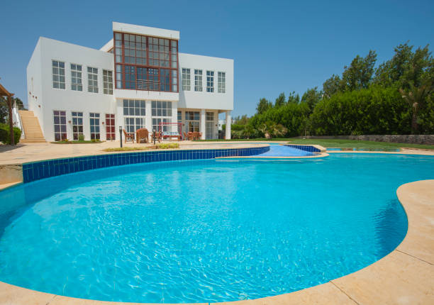 istock Swimming pool at at luxury tropical holiday villa 841246810