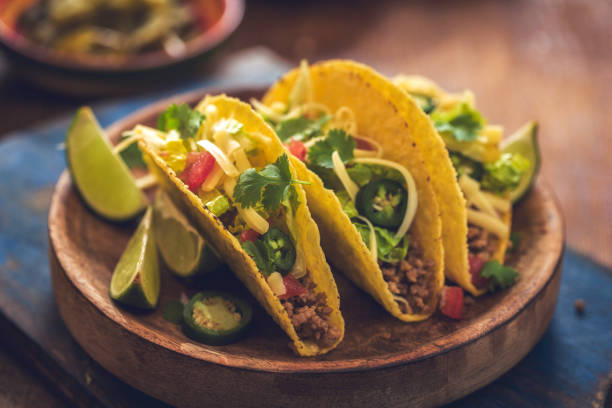 istock Mexican Tacos with Spicy Salsa, Minced Meat and Guacamole 841253788