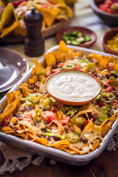 istock Nachos Tortilla Chips with Salsa, Minced Meat and Jalapenos 841253816