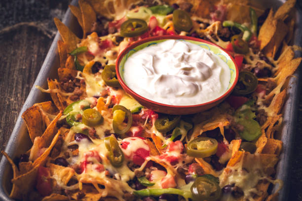 istock Nachos Tortilla Chips with Salsa, Minced Meat and Jalapenos 841253818