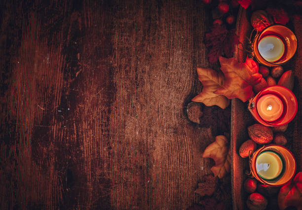 Autumn Decoration Background with Candles, Pumpkins, Leafs and Nuts