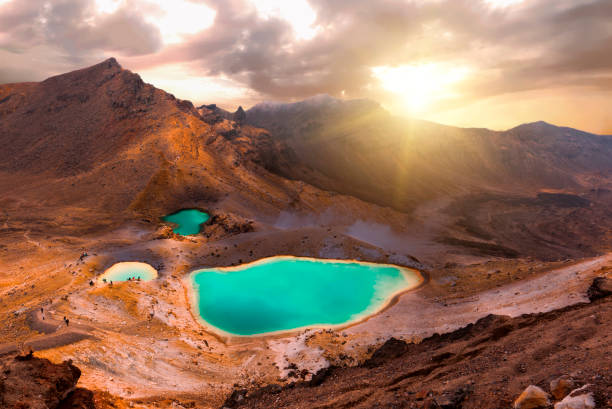 Tongariro Crossing View at beautiful sunrise over Emerald lakes on Tongariro Crossing track, Tongariro National Park, New Zealand tongariro national park photos stock pictures, royalty-free photos & images